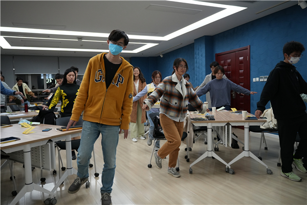 1669097740631527.jpg 图三_参与学员参与体验活动.jpg